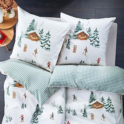 Gemütliche Winter-Bettwäsche mit Ski- und Hüttendekor