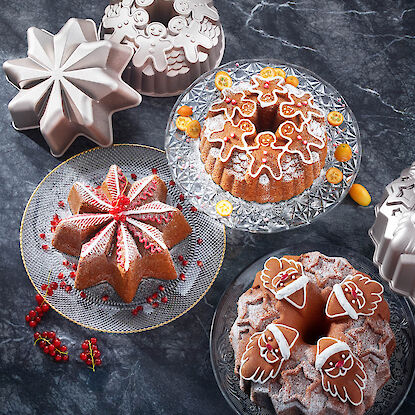 Weihnachtliche Backformen aus Aluminium mit Stern- und Lebkuchenmann-Motiv – ideal für festliche Kuchen