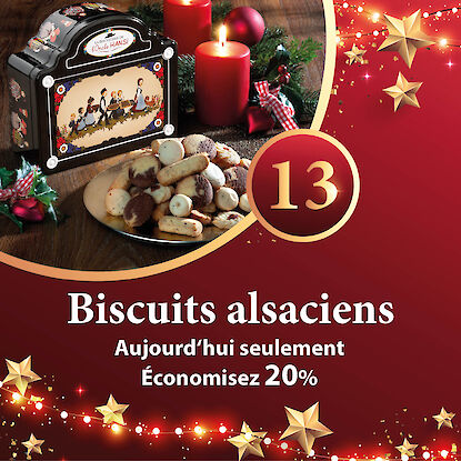 Bannière avec boîte de biscuits alsaciens et assiette de bredele, avec annonce d’une réduction de 20 %.
